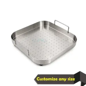 Stainless steel bowl strainer with perforated base and handles for commercial kitchen draining.